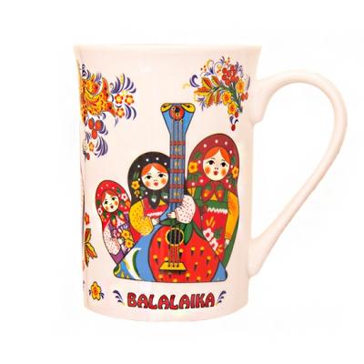 Фото - Сувенирная кружка Матрешки с балалайкой 250 мл Фото - Сувенирная кружка Матрешки с балалайкой 250 мл