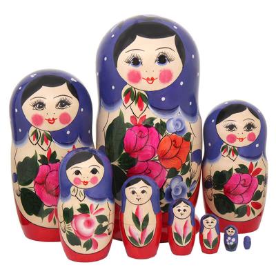 Фото - Матрешка традиционная 9 мест синий платочек 24 см